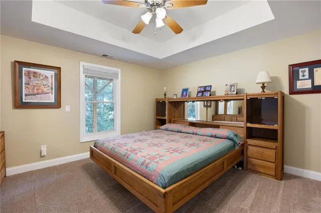 a view of a wooden chairs on the deck