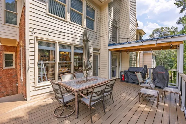 an aerial view of a house with a yard and garden