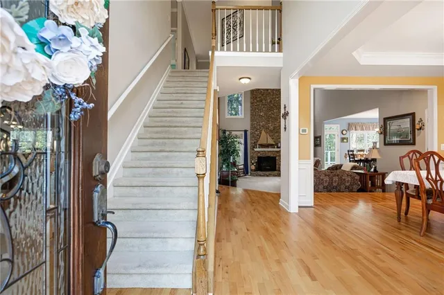 a view of a hallway view with living room and with furniture