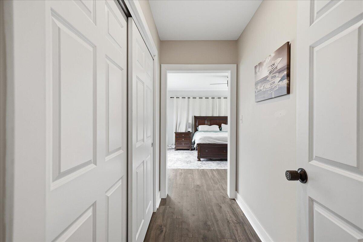 6411 East 129th Avenue Crown Point, IN 46307 - Photo 16 of 79 a walk in closet with wooden floor