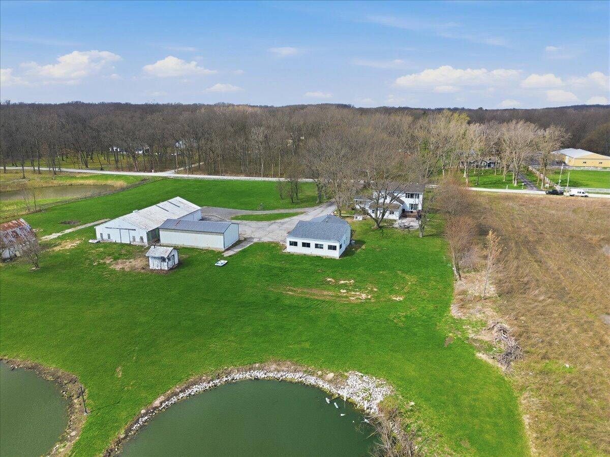 6411 East 129th Avenue Crown Point, IN 46307 - Photo 2 of 79 an aerial view of a house with green yard
