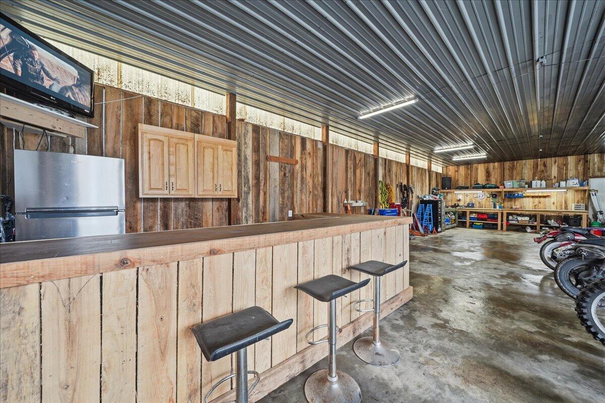 6411 East 129th Avenue Crown Point, IN 46307 - Photo 32 of 79 a view of a porch with furniture