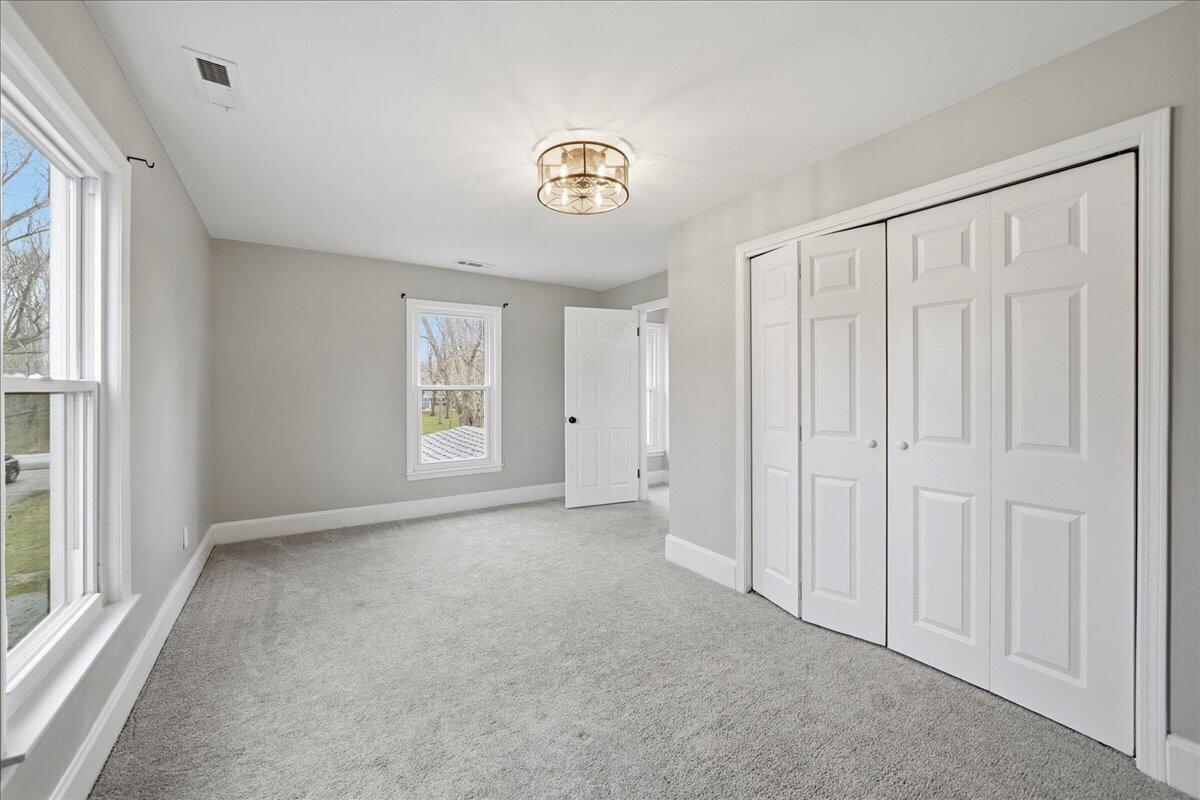 6411 East 129th Avenue Crown Point, IN 46307 - Photo 46 of 79 a view of an empty room with a window