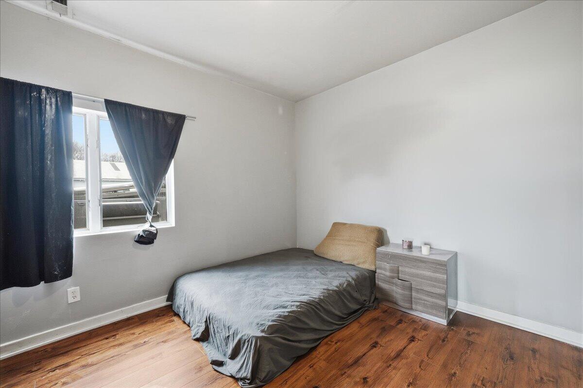 6411 East 129th Avenue Crown Point, IN 46307 - Photo 53 of 79 a bedroom with a bed and window
