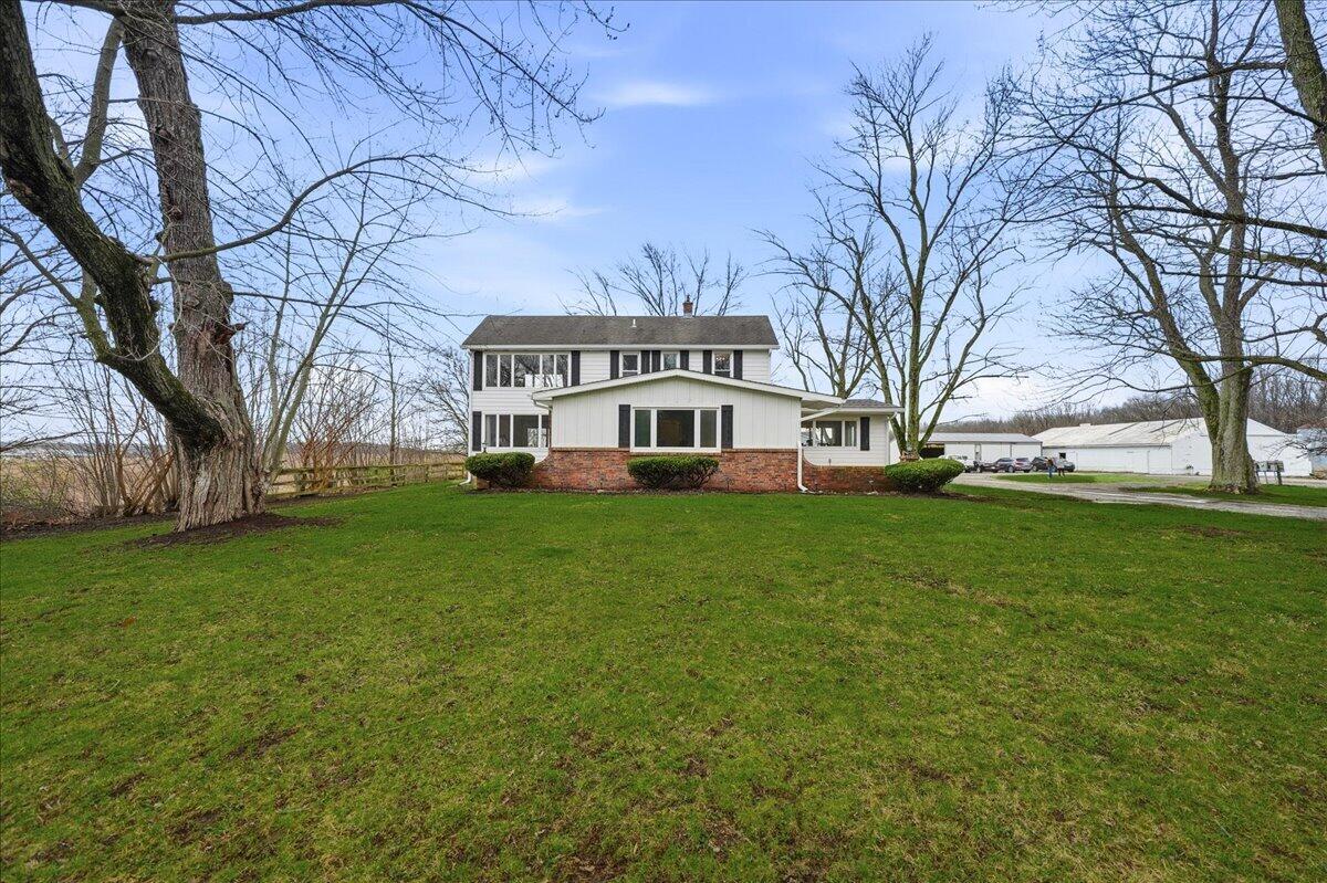 6411 East 129th Avenue Crown Point, IN 46307 - Photo 66 of 79 a view of a house with a big yard