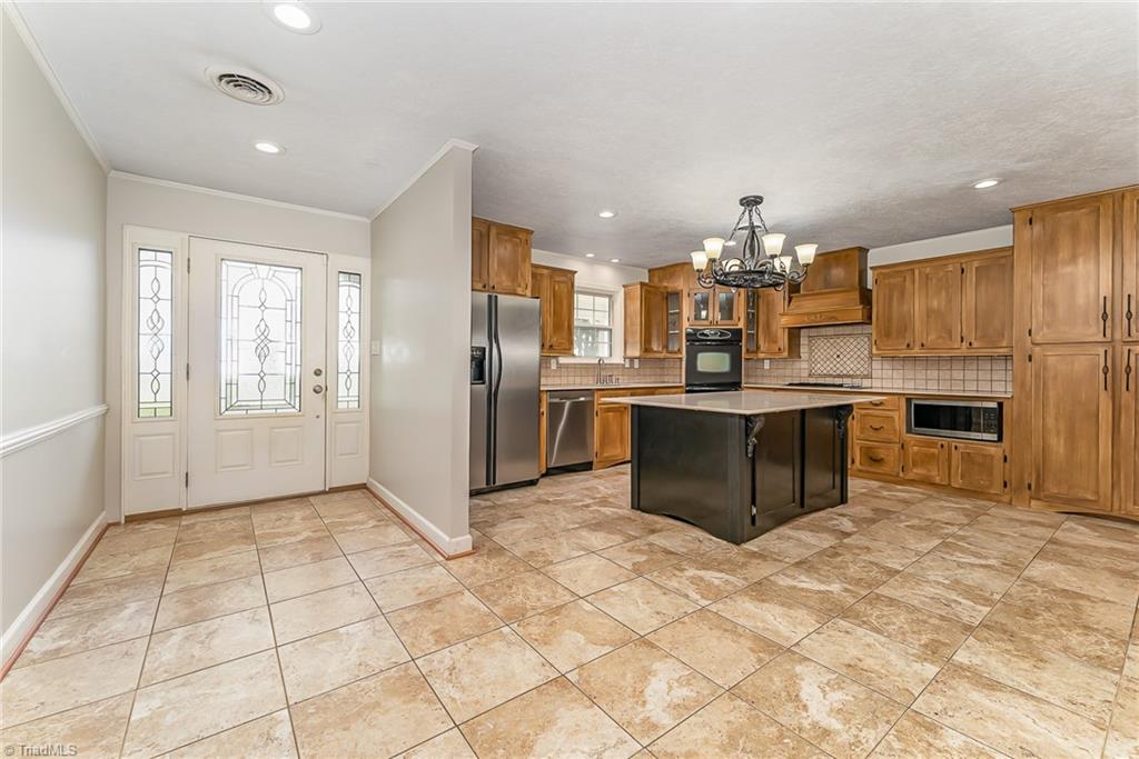 310 Tesh Road Clemmons, NC 27012 - Photo 5 of 50 Entry and Kitchen