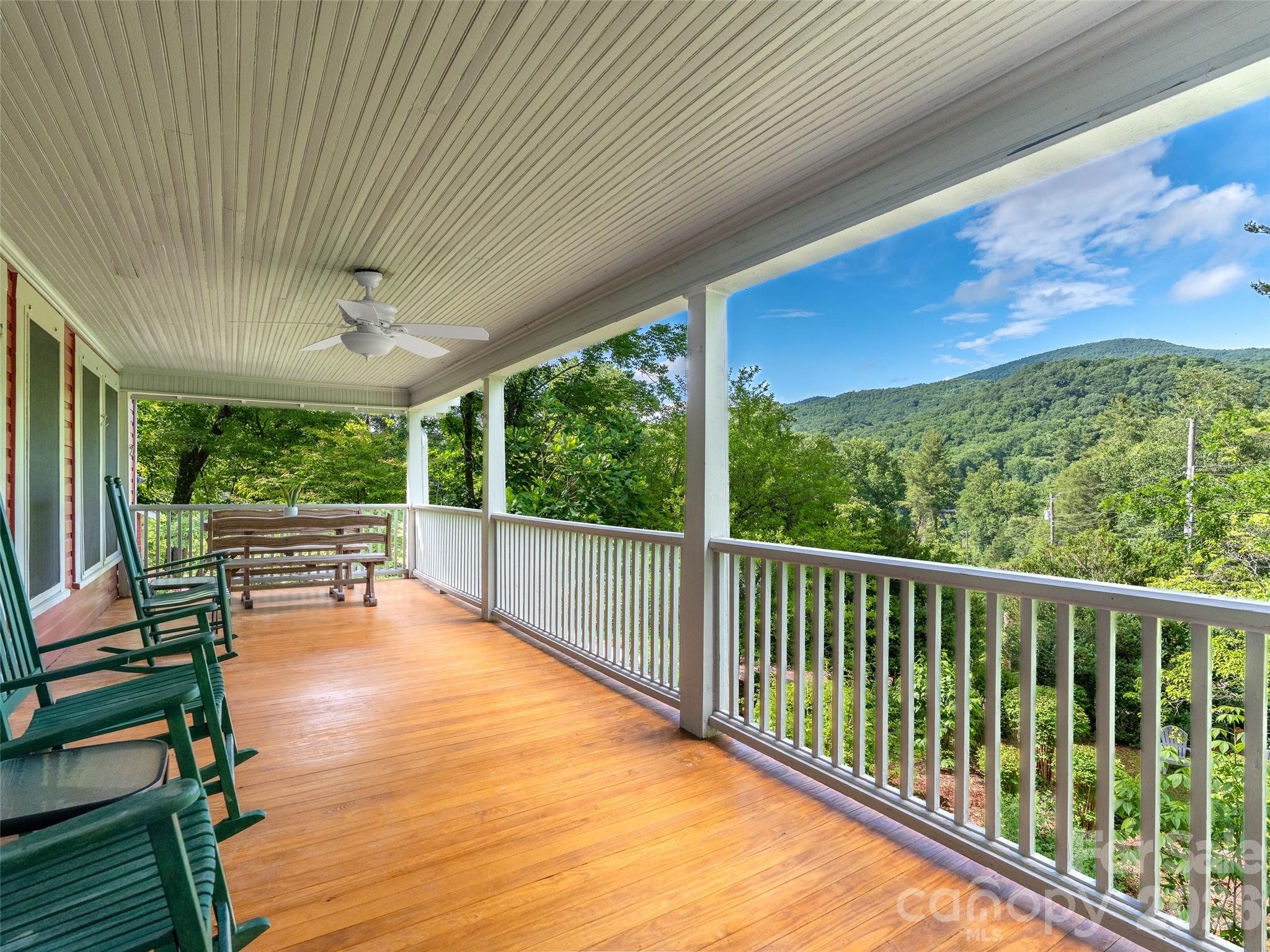 206 Chestnut Hill Road Gerton, NC 28735 - Photo 20 of 48 a view of a patio with wooden floor
