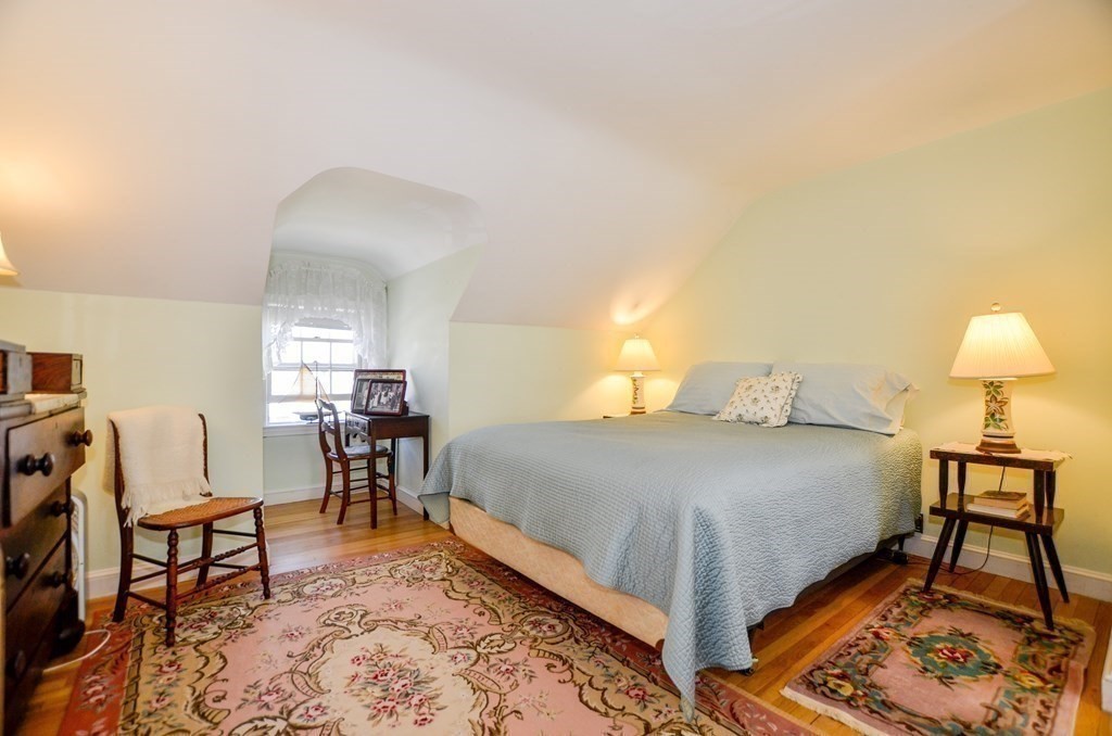 10 Zora Road Marion, MA 02738 - Photo 25 of 37 a bed room with a bed and a chair