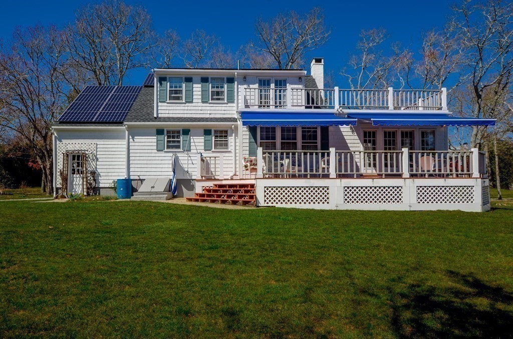 10 Zora Road Marion, MA 02738 - Photo 5 of 37 a front view of a house with a garden