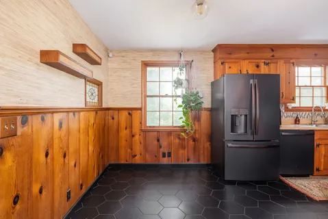 an entryway with wooden door