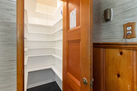 a balcony with furniture and outdoor view