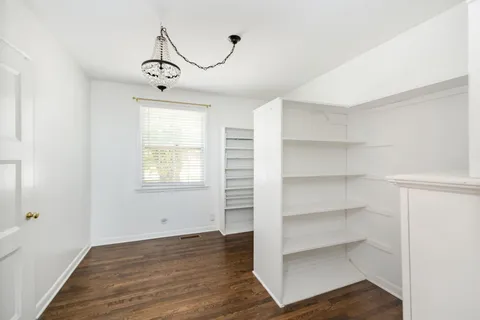 an outdoor living area with furniture