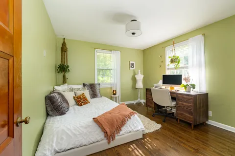 a view of a water heater room with a garage