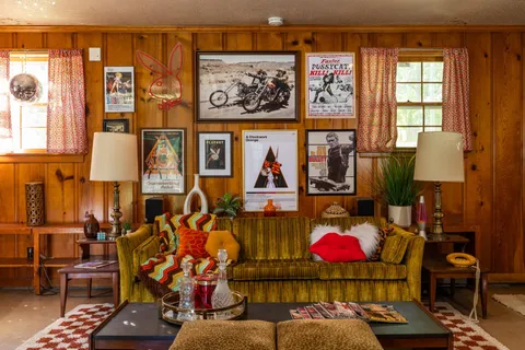 a room with painting and a table