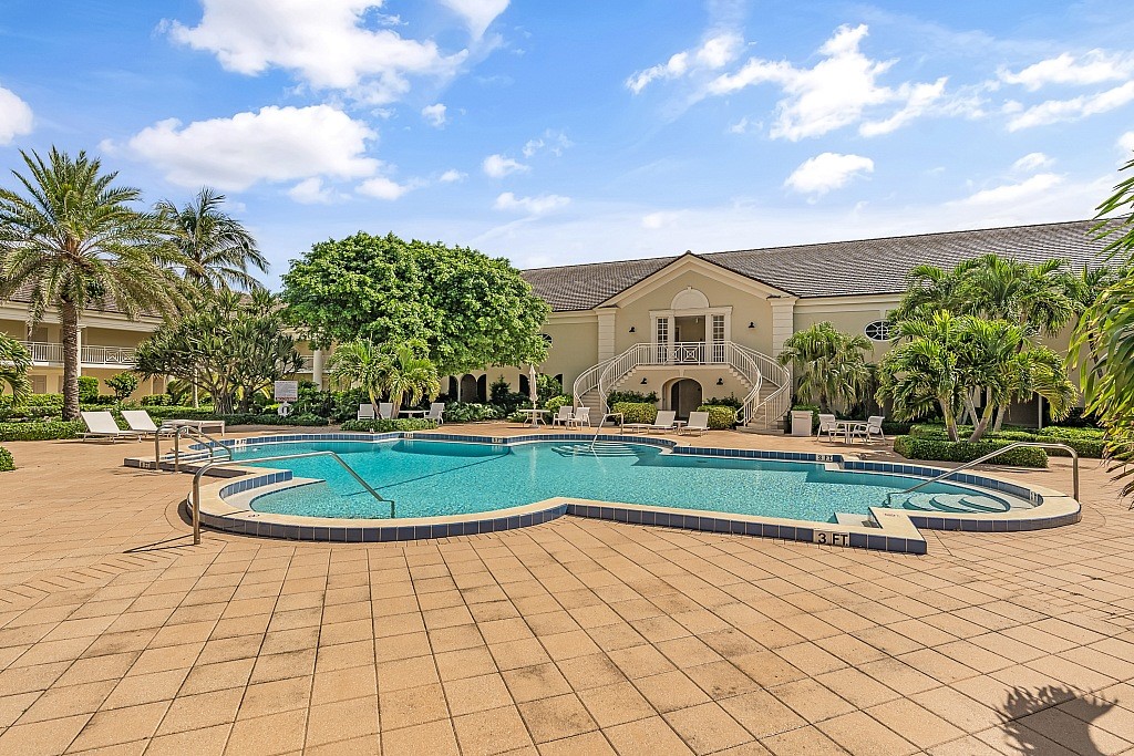 400 Beach Road, Unit 117 Vero Beach, FL 32963 - Photo 17 of 23 a front view of a house with garden