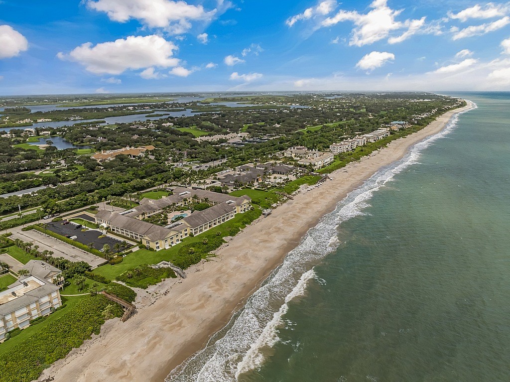 400 Beach Road, Unit 117 Vero Beach, FL 32963 - Photo 19 of 23 an aerial view of residential houses with outdoor space