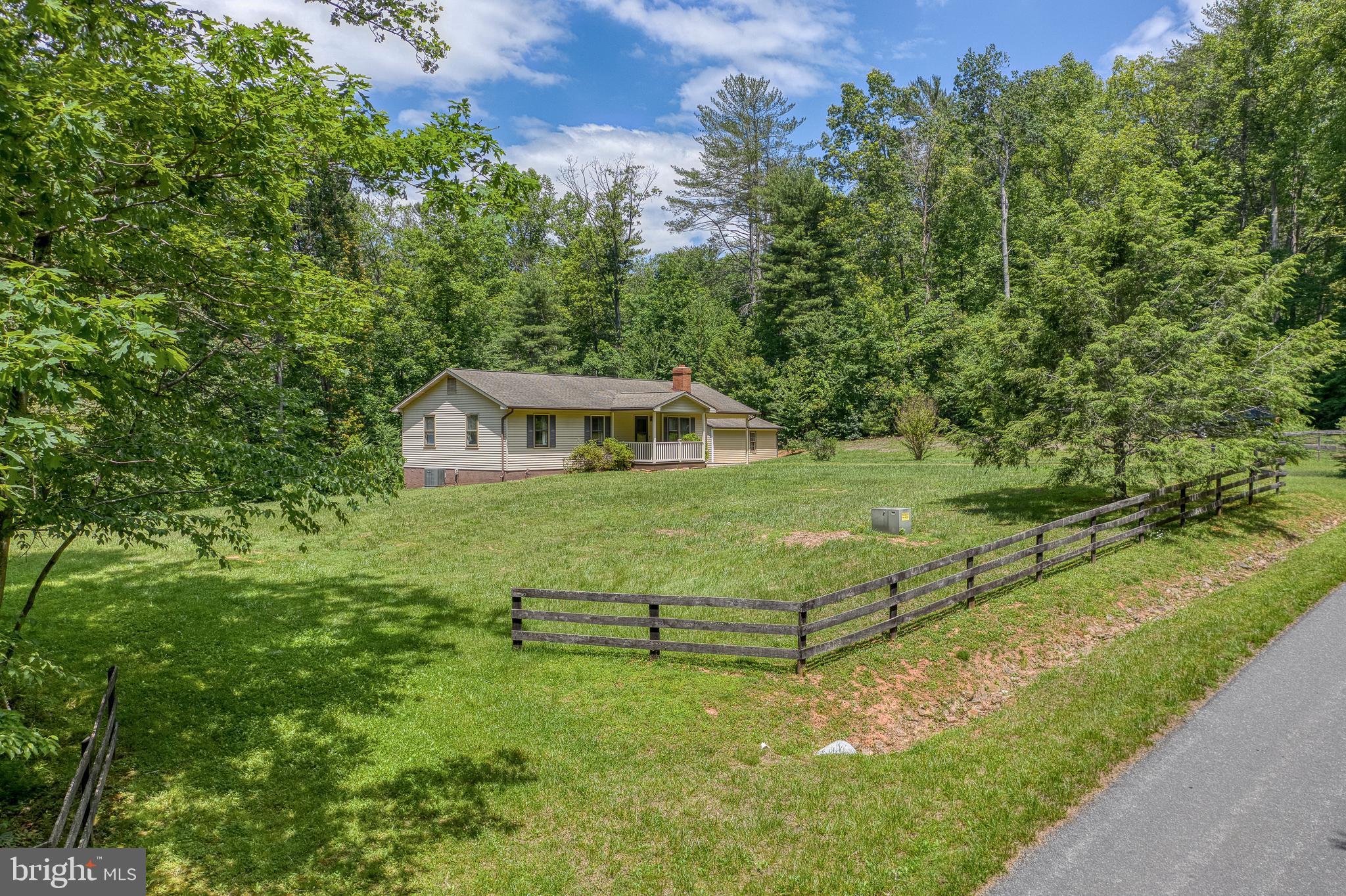 803 Weaver Hollow Road Banco, VA 22711 - Photo 67 of 67 a view of a house with a yard