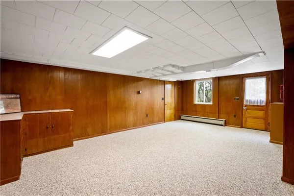 a room with furniture and a window