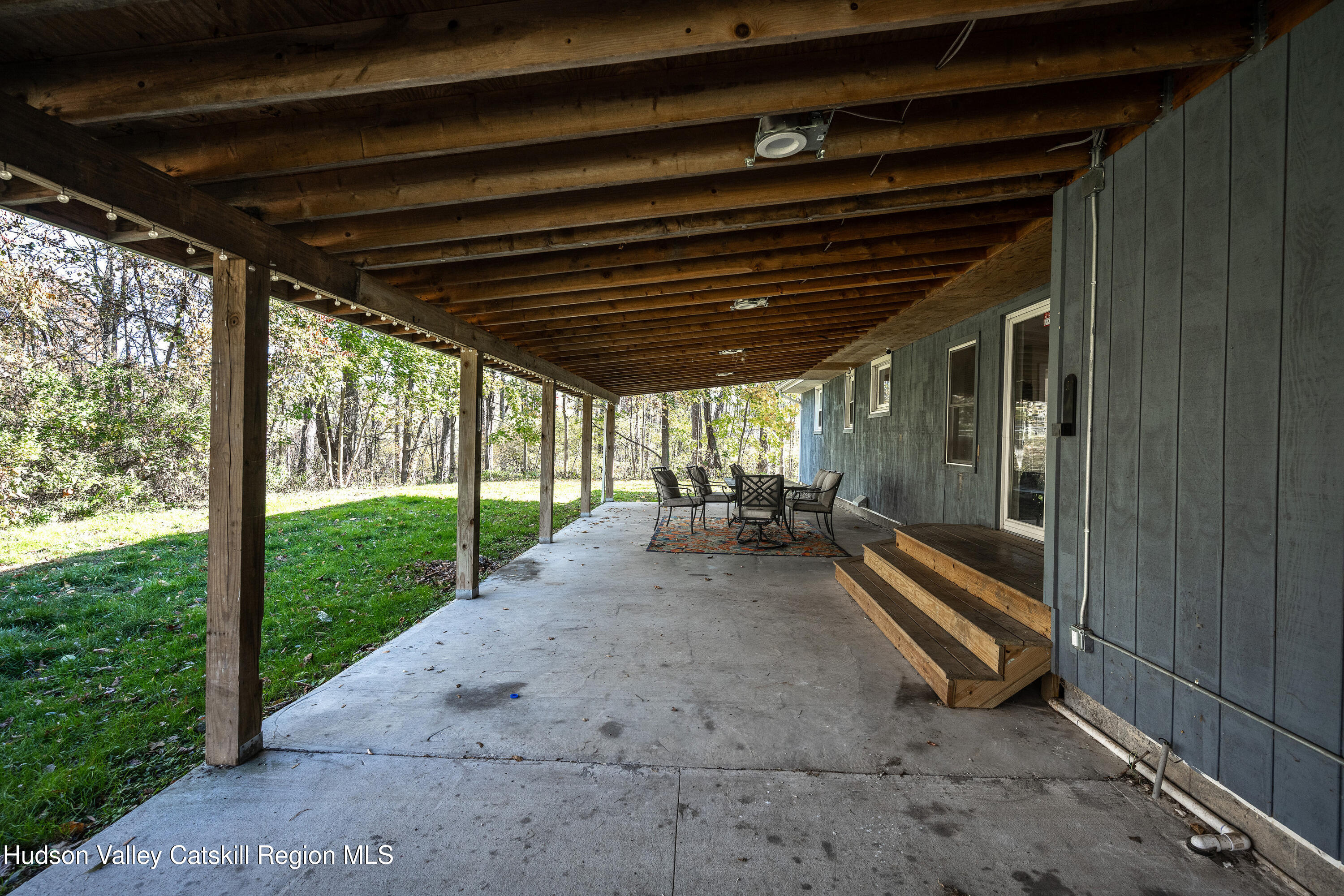 3024 Highway 213 Stone Ridge, NY 12484 - Photo 30 of 31 a view of a room with wooden floor and roof