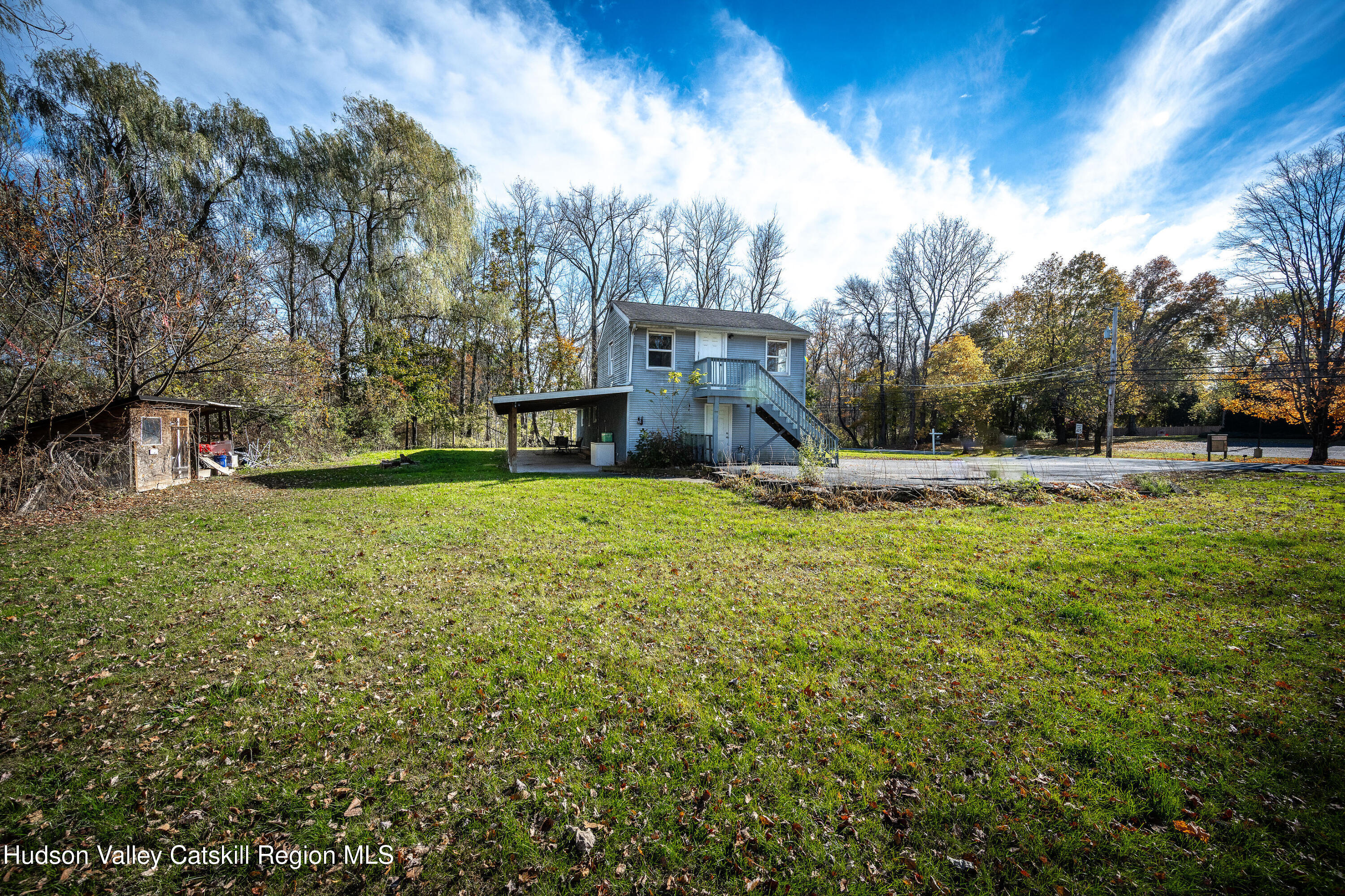 3024 Highway 213 Stone Ridge, NY 12484 - Photo 31 of 31 a view of a house with a yard