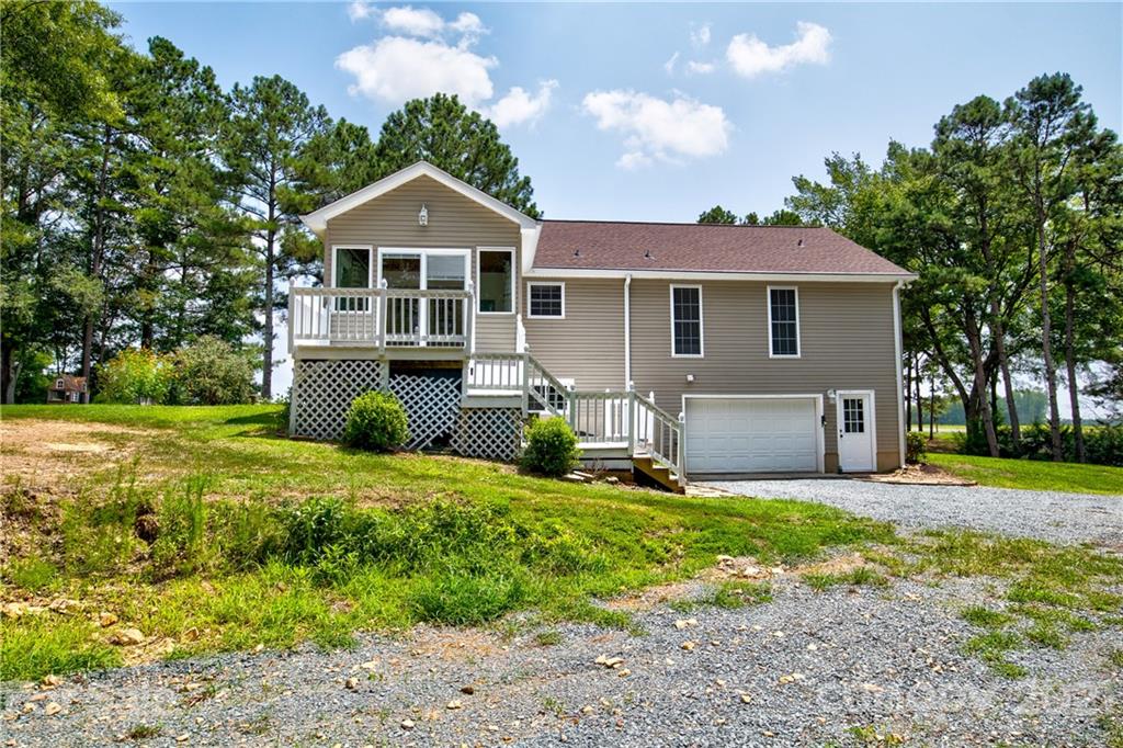 4004 Belk Mill Road Wingate, NC 28174 - Photo 28 of 44 a front view of house with yard and green space