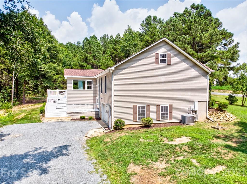 4004 Belk Mill Road Wingate, NC 28174 - Photo 43 of 44 a view of a yard in front of house