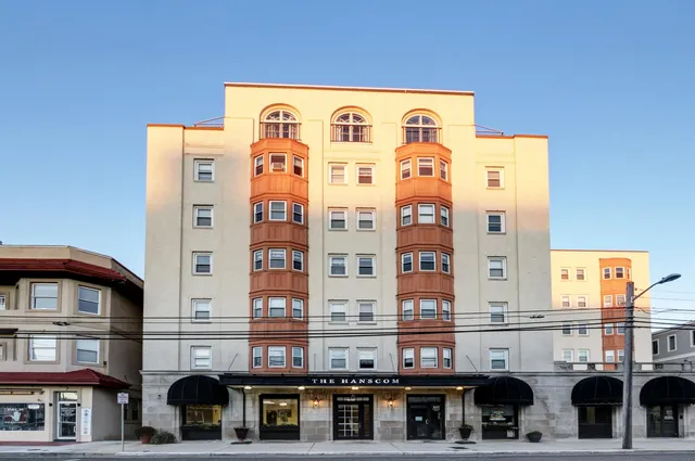 a front view of a multi story building