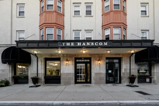 a view of a building with brick walls