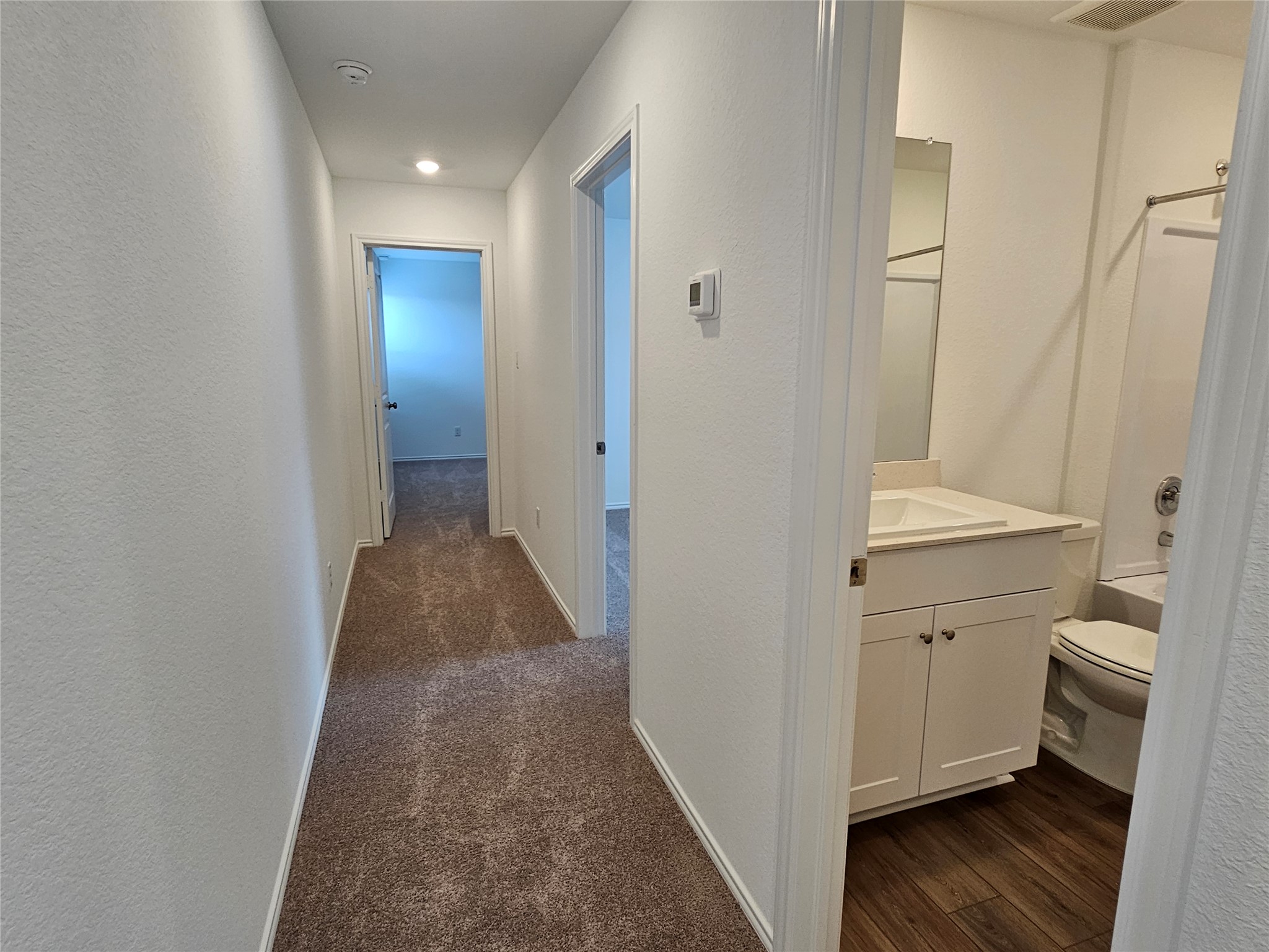 704 Commander Abbott Drive Jarrell, TX 76537 - Photo 13 of 29 a view of hallway with sink