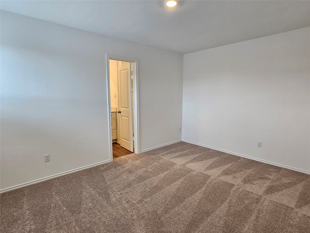 704 Commander Abbott Drive Jarrell, TX 76537 - Photo 17 of 29 a view of an empty room with a window