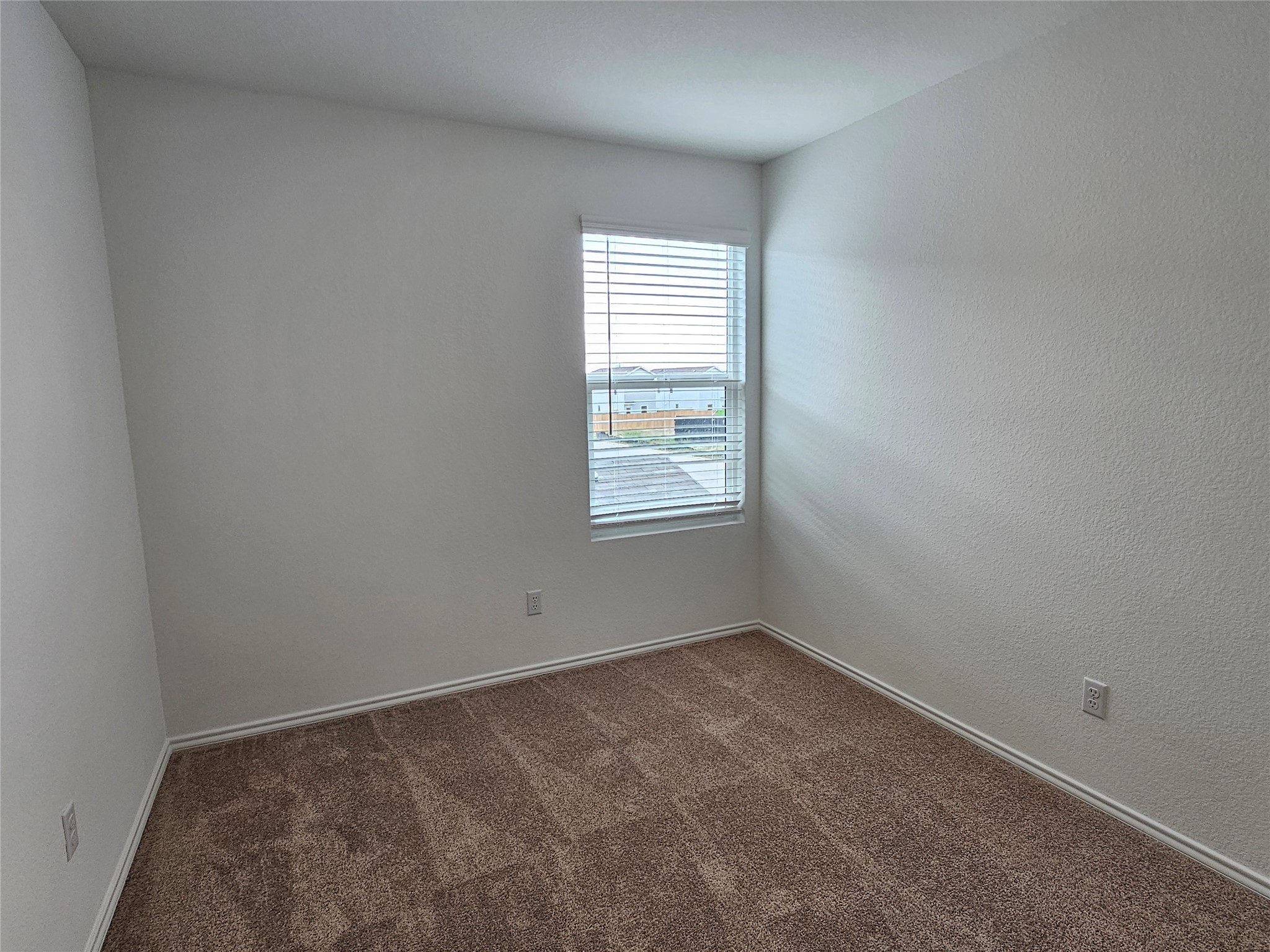 704 Commander Abbott Drive Jarrell, TX 76537 - Photo 22 of 29 an empty room with a window