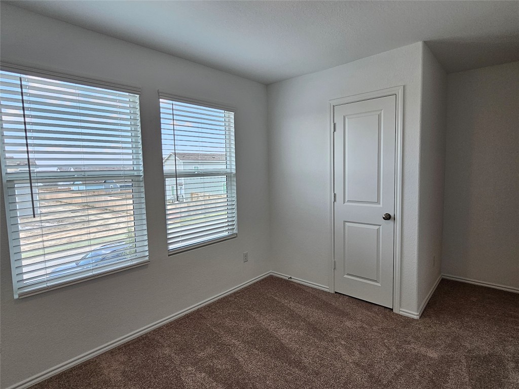 704 Commander Abbott Drive Jarrell, TX 76537 - Photo 26 of 29 an empty room with a window