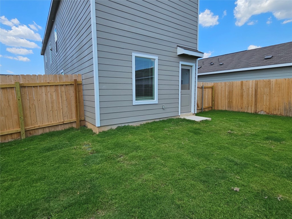 704 Commander Abbott Drive Jarrell, TX 76537 - Photo 29 of 29 front view of a house with a yard