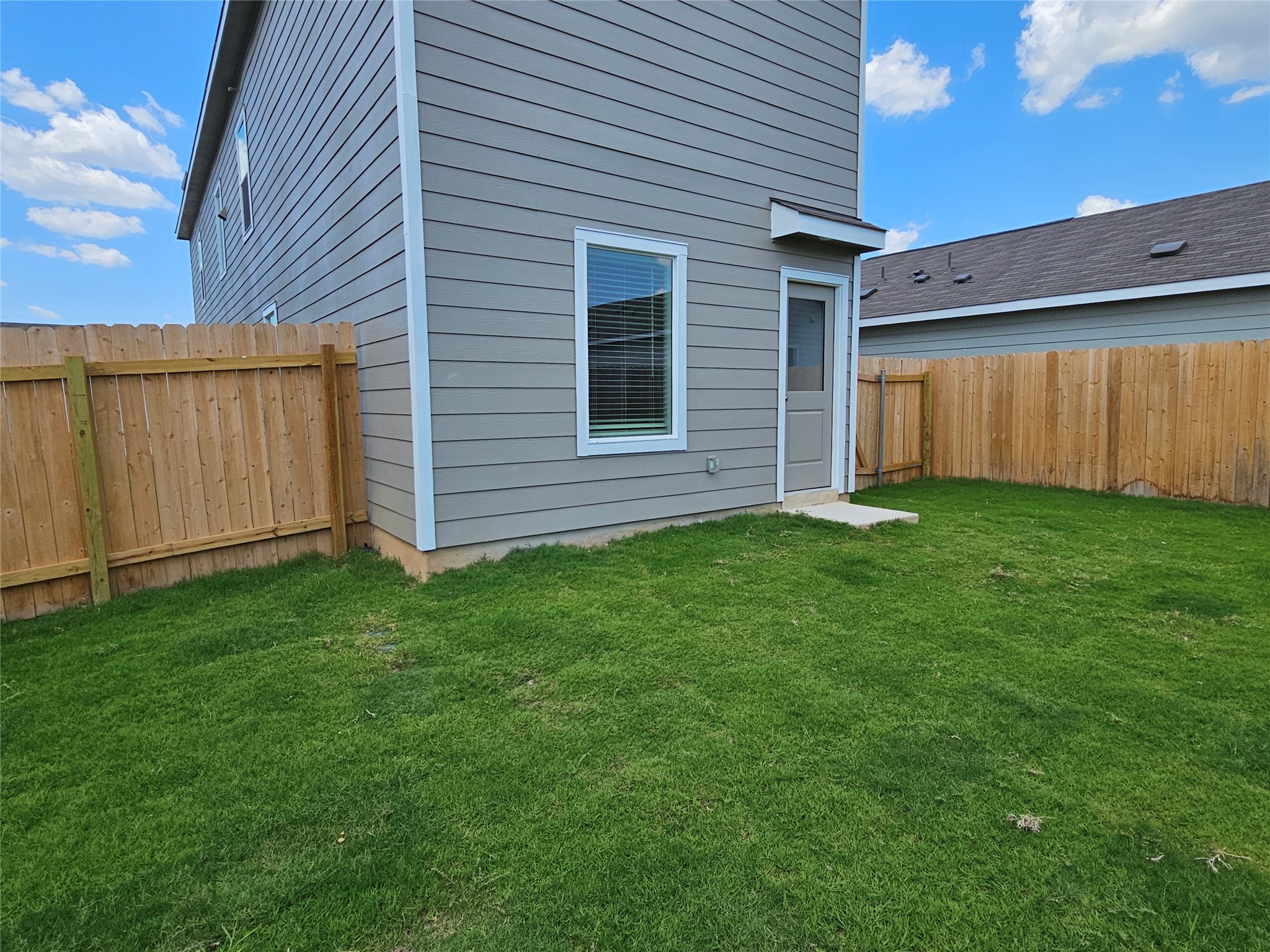 704 Commander Abbott Drive Jarrell, TX 76537 - Photo 29 of 29 front view of a house with a yard