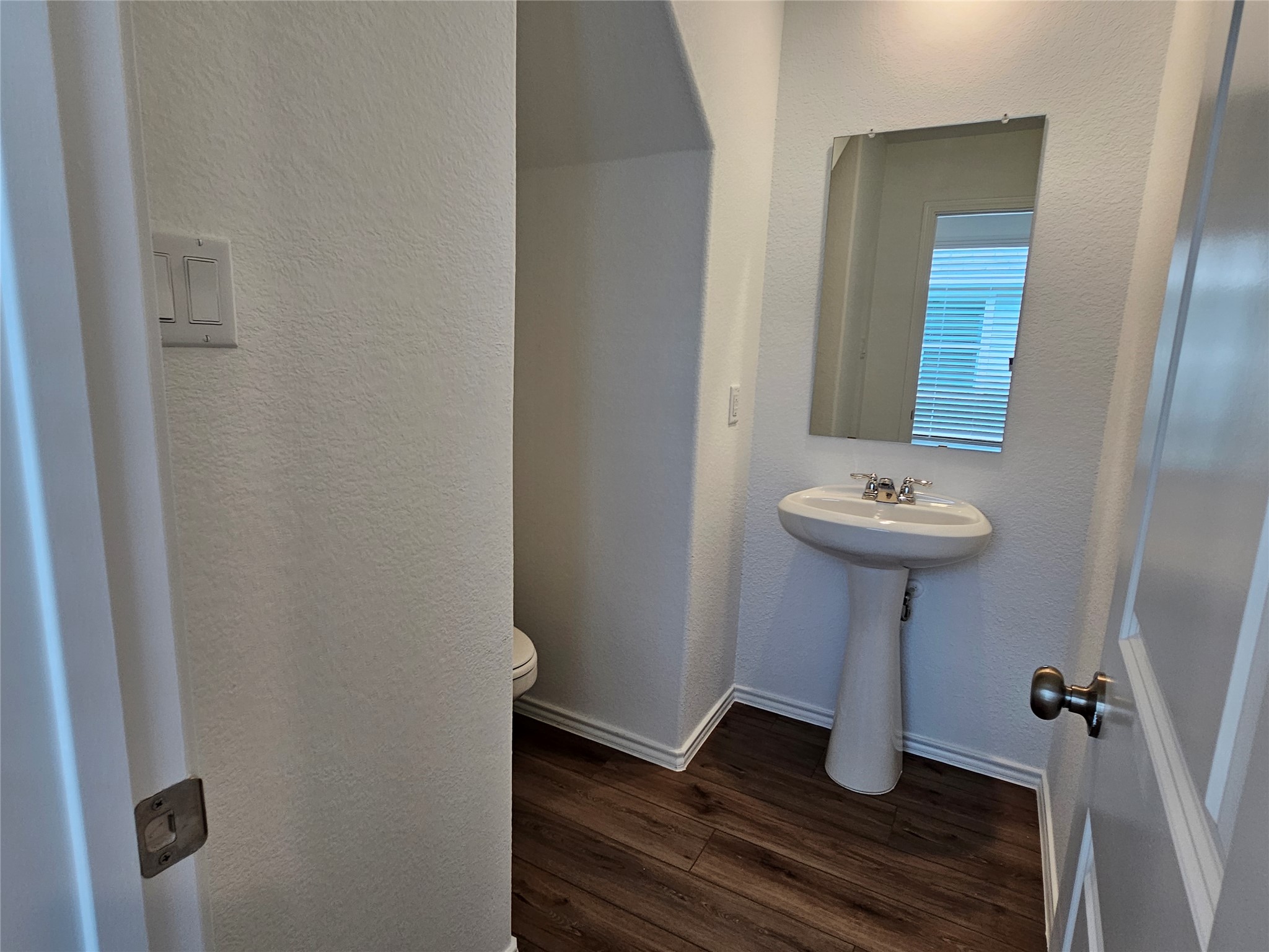704 Commander Abbott Drive Jarrell, TX 76537 - Photo 6 of 29 a bathroom with a sink and mirror