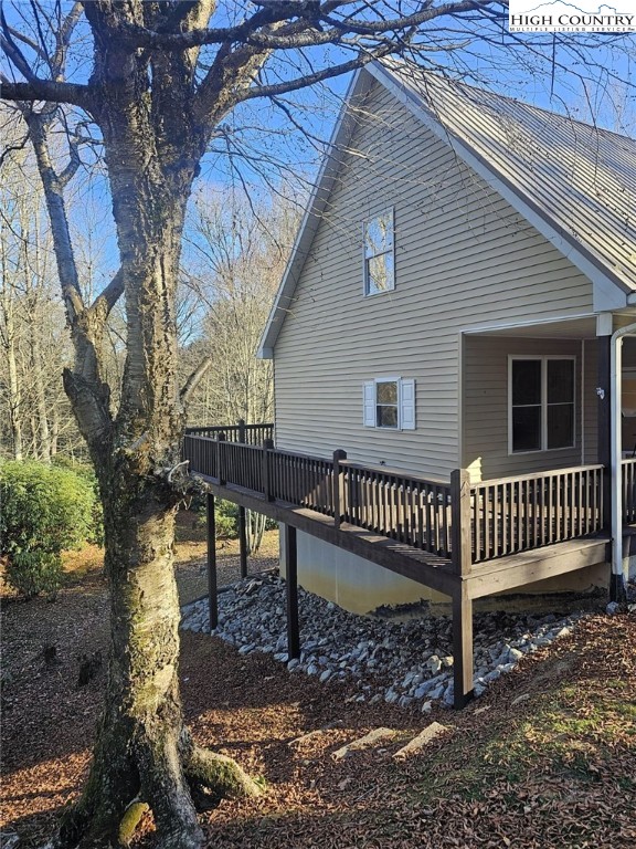 711 Trice Fork Mountain Road Newland, NC 28657 - Photo 12 of 22 a view of a house with a bench