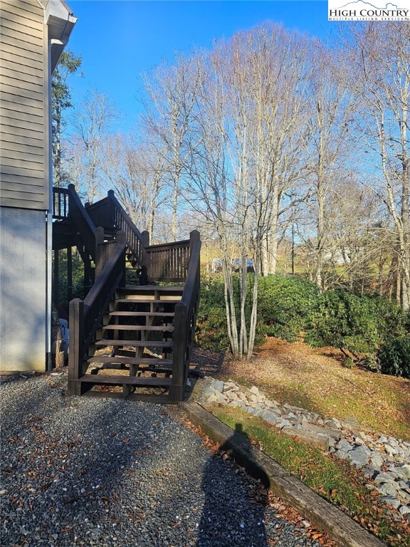 711 Trice Fork Mountain Road Newland, NC 28657 - Photo 14 of 22 a view of a yard with wooden fence