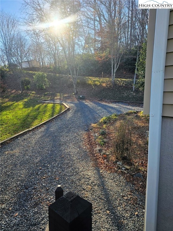 711 Trice Fork Mountain Road Newland, NC 28657 - Photo 20 of 22 a view of a backyard with green space