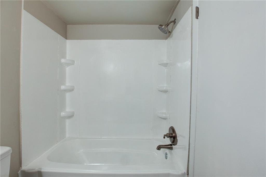 7325 Cardigan Circle Atlanta, GA 30328 - Photo 12 of 31 a close view of a bathtub in bathroom