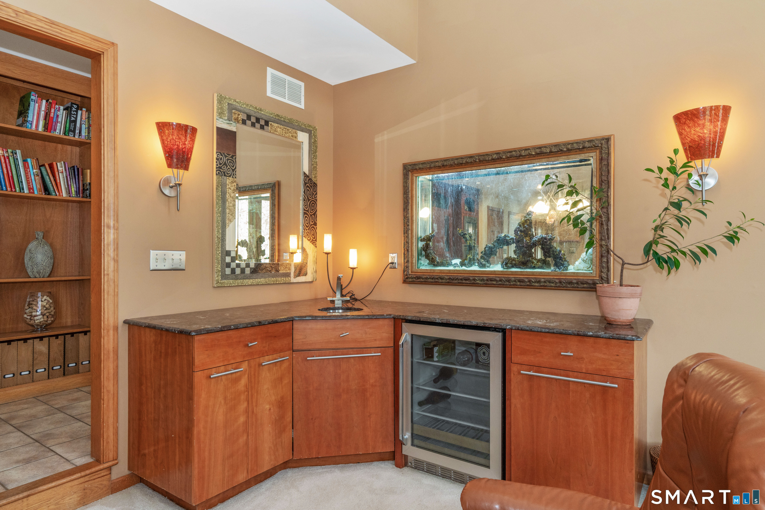 67 Hunter's Crossing Burlington, CT 06013 - Photo 11 of 35 The wet bar with beverage fridge is perfect for entertaining!