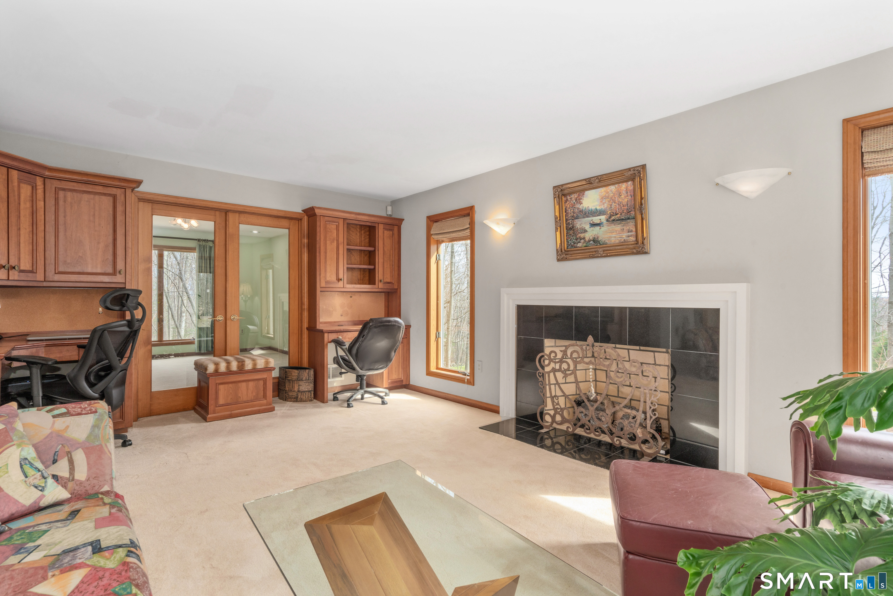 67 Hunter's Crossing Burlington, CT 06013 - Photo 14 of 35 a living room with furniture a window and a fireplace