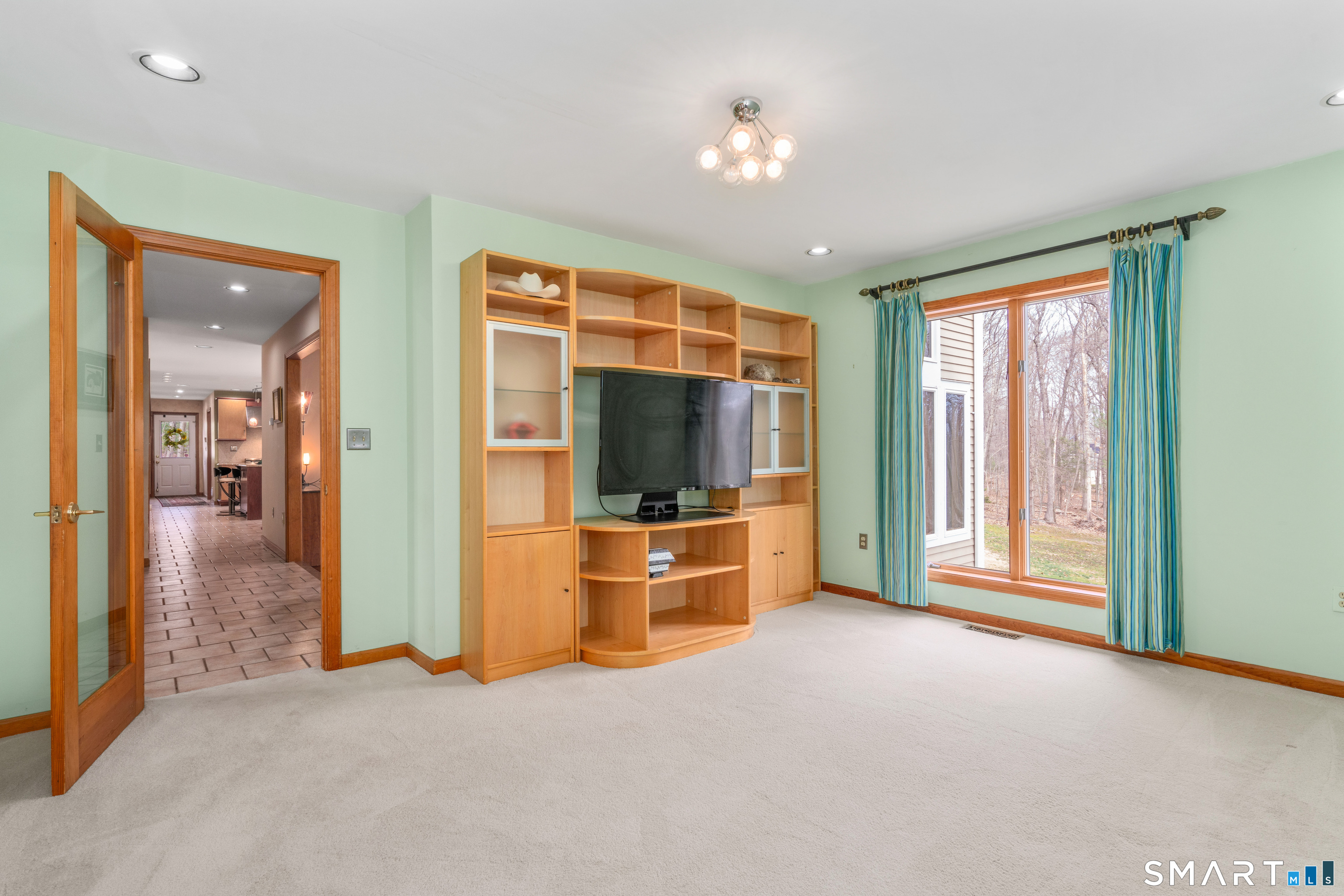 67 Hunter's Crossing Burlington, CT 06013 - Photo 16 of 35 a view of an empty room with a kitchen