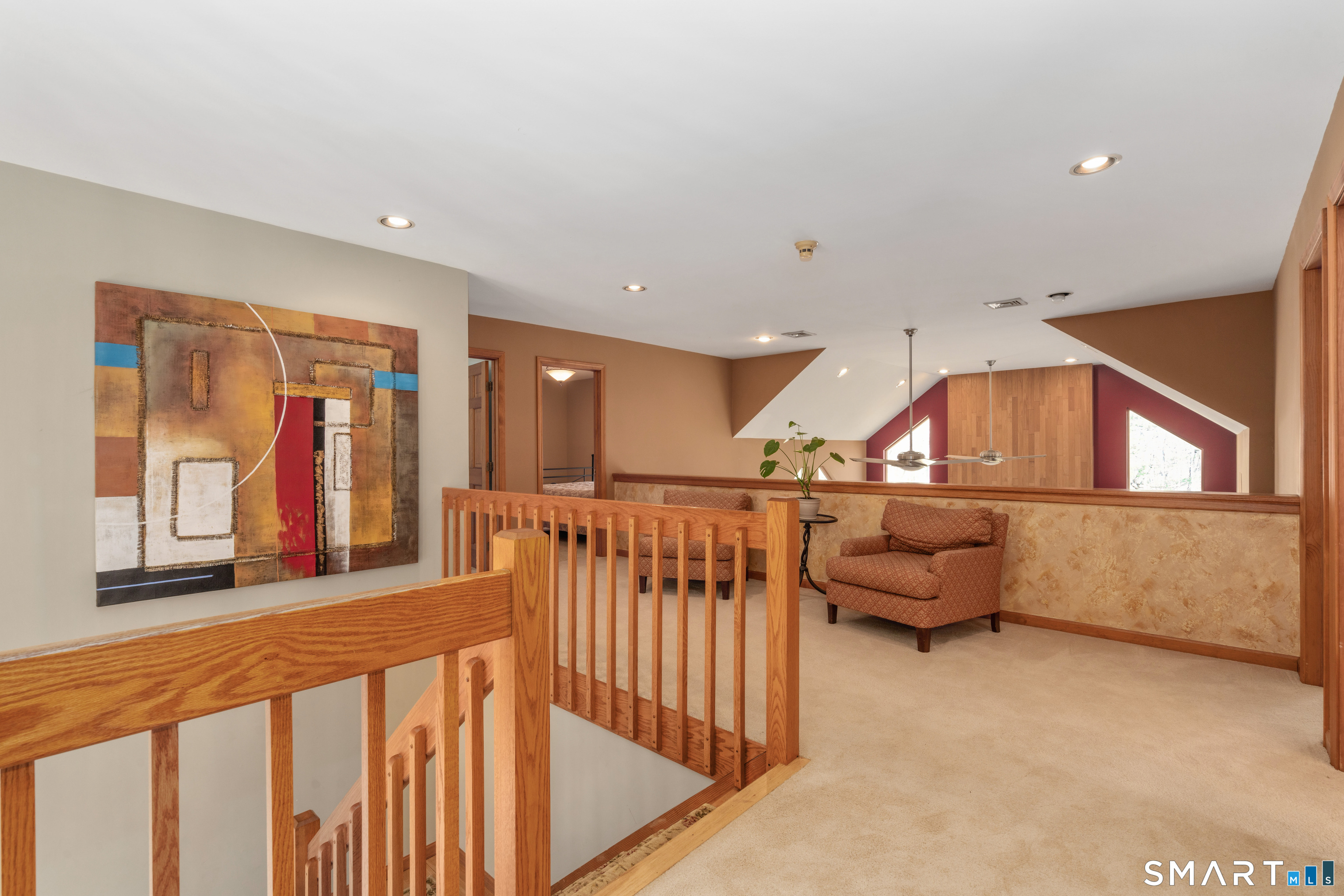 67 Hunter's Crossing Burlington, CT 06013 - Photo 17 of 35 a view of interior space with furniture and lots of wooden floor
