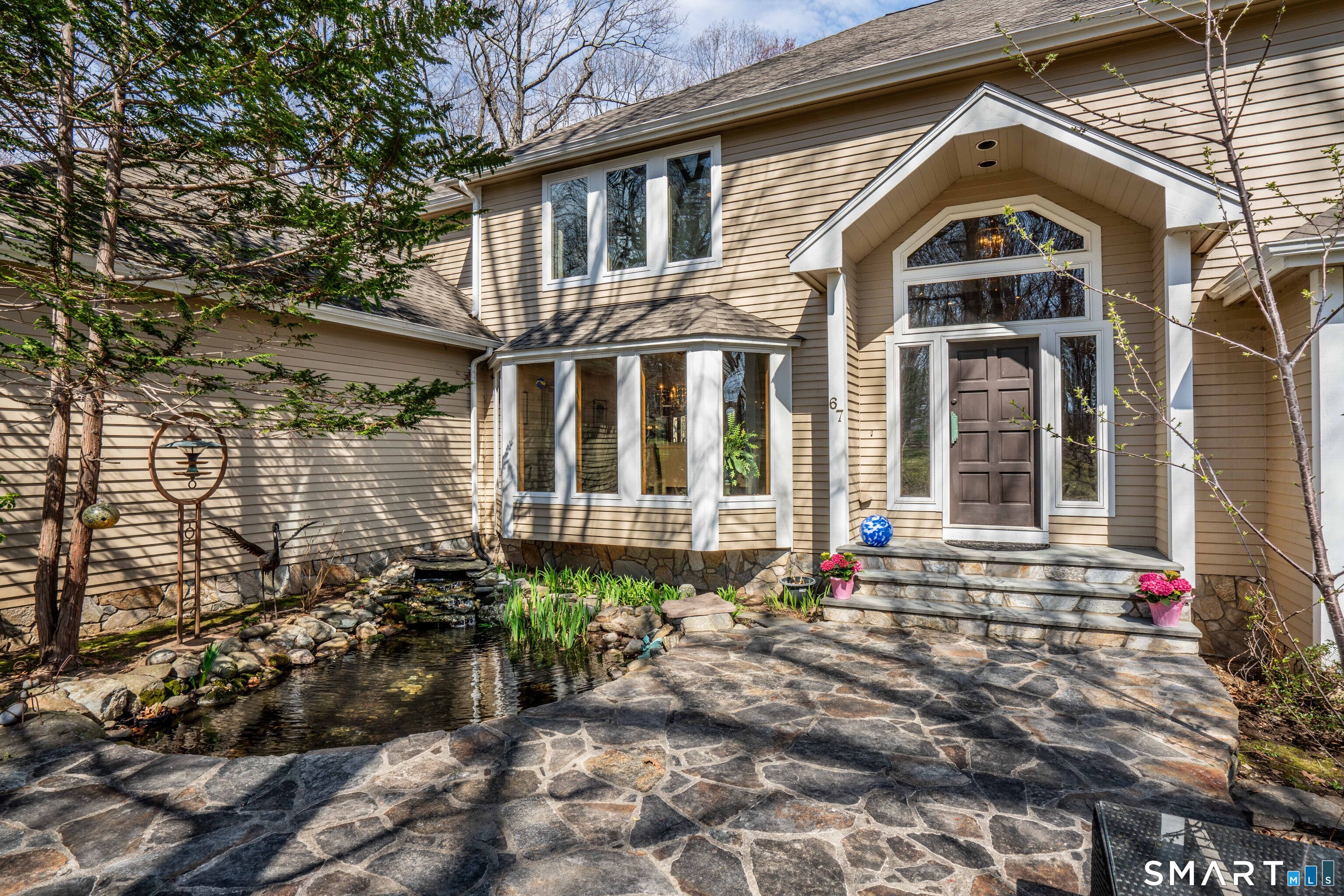 67 Hunter's Crossing Burlington, CT 06013 - Photo 2 of 35 a front view of a house