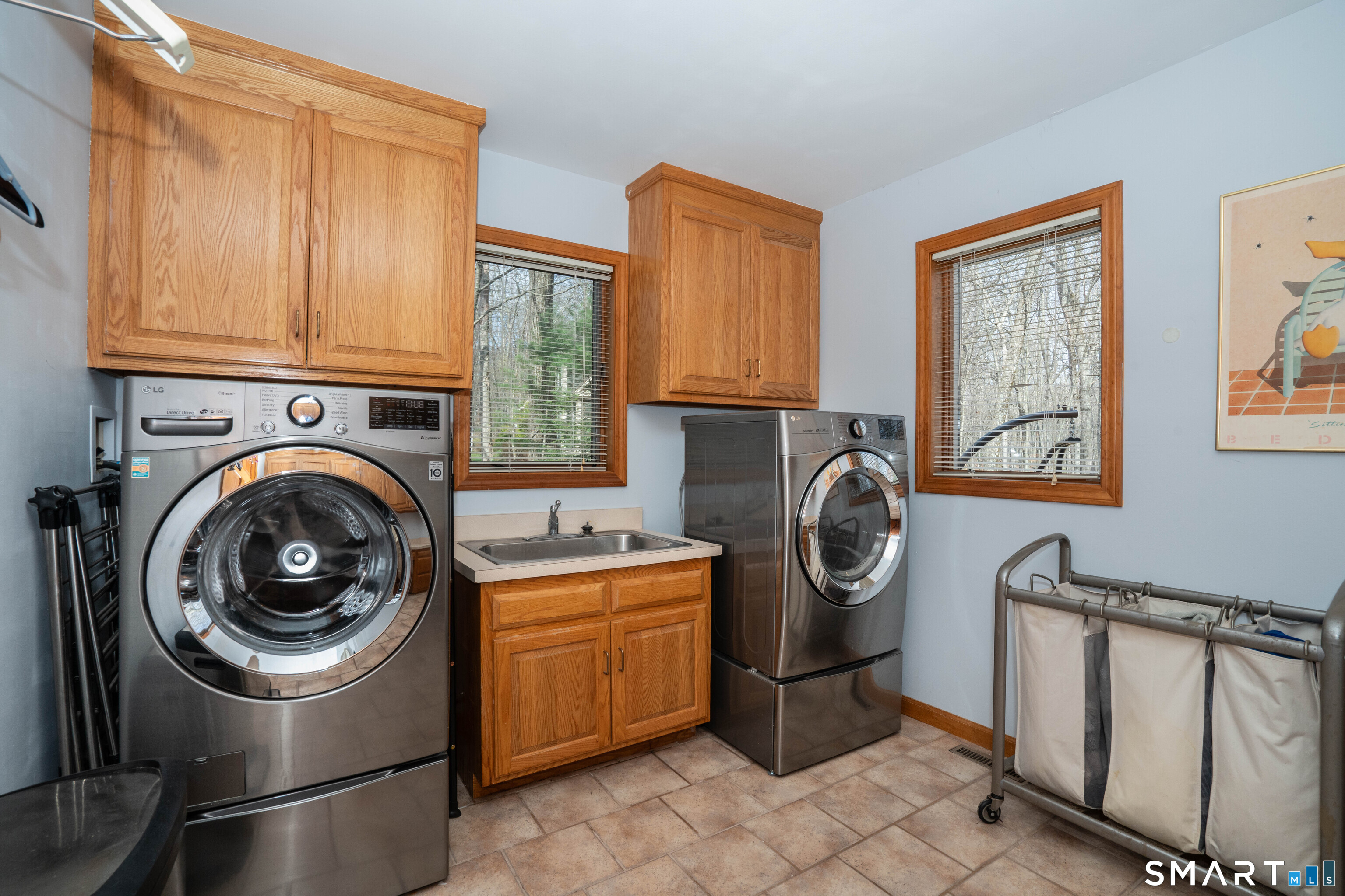 67 Hunter's Crossing Burlington, CT 06013 - Photo 29 of 35 a utility room with dryer washer and closet
