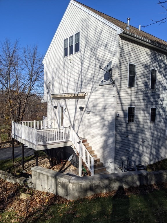 44 Boxford Road, Unit 44 Haverhill, MA 01835 - Photo 1 of 13 a view of a balcony with a basket ball court