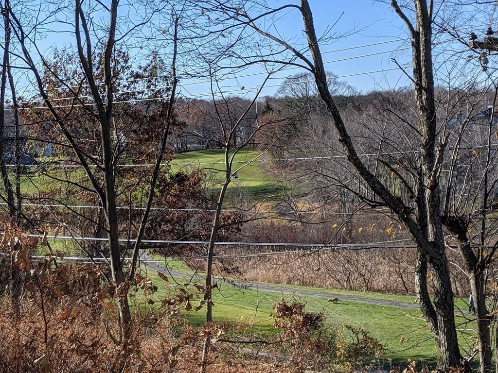 44 Boxford Road, Unit 44 Haverhill, MA 01835 - Photo 2 of 13 a backyard of a house with lots of green space