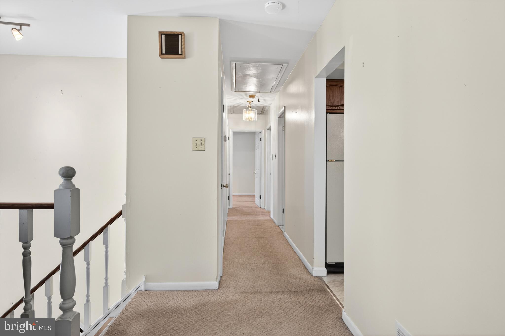 3701 Ebright Road Chadds Ford, PA 19317 - Photo 24 of 45 a view of a hallway with wooden floor and staircase