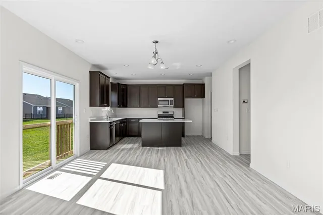 $596,245 | 12201 Louiselle Park Drive, Maryland Heights, MO 63043