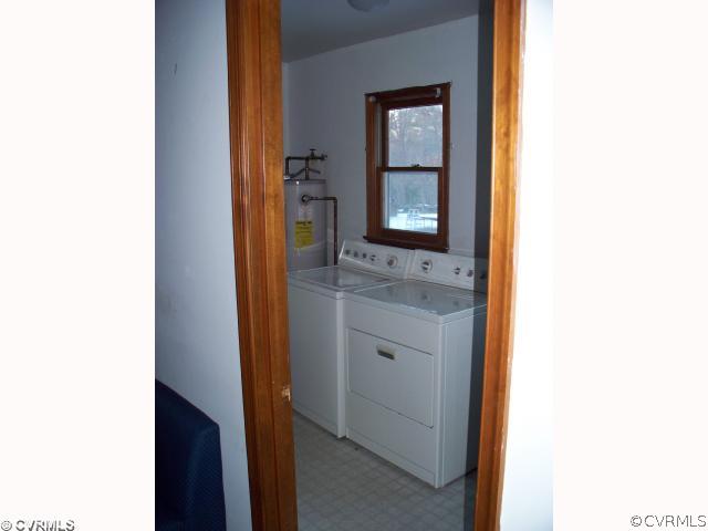 4700 Brookridge Road Chesterfield, VA 23832 - Photo 6 of 8 a bathroom with a sink and a mirror